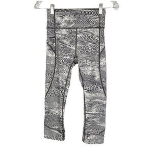 Lululemon Womens In Movement Crop Everlux 19 Swerve Vapor Metal Grey size 4